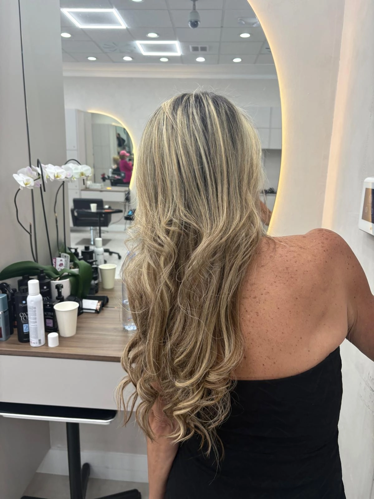 Long blonde highlights with loose waves