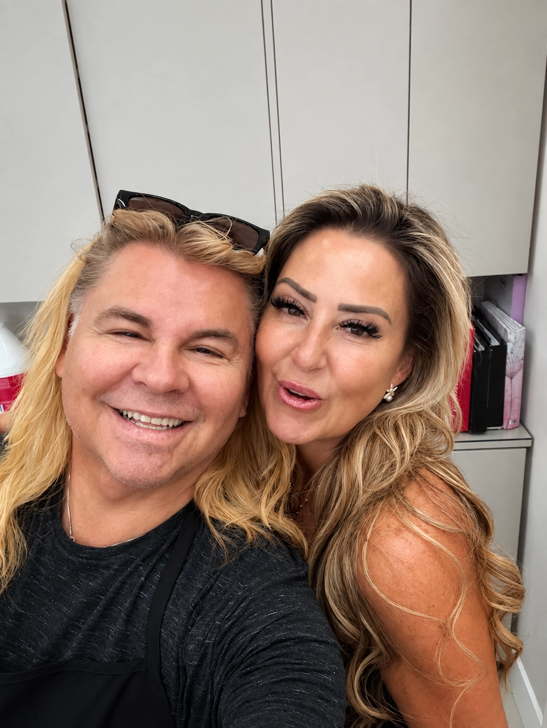 George with a smiling client after her color
