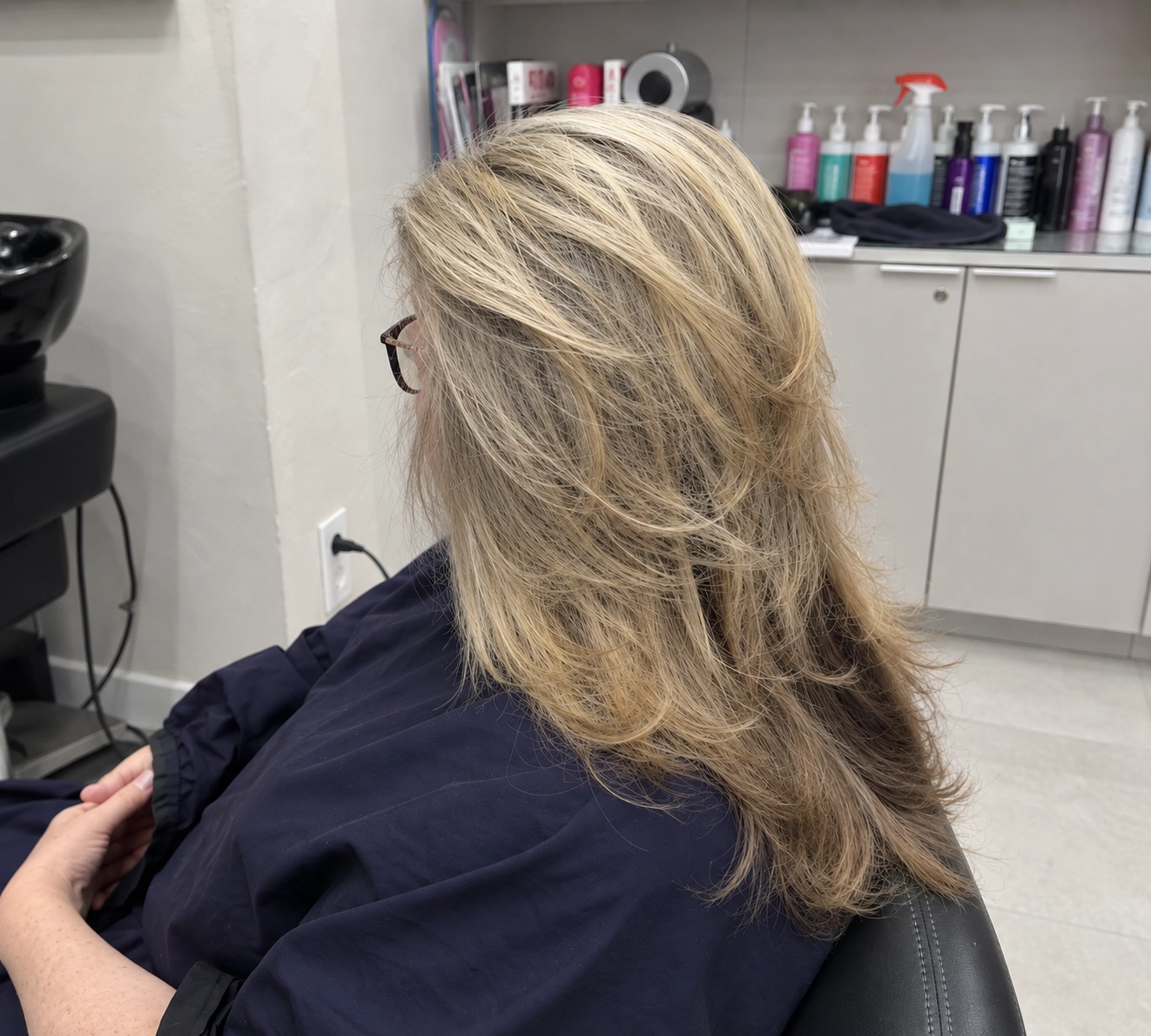 Glowing layered blonde in the salon